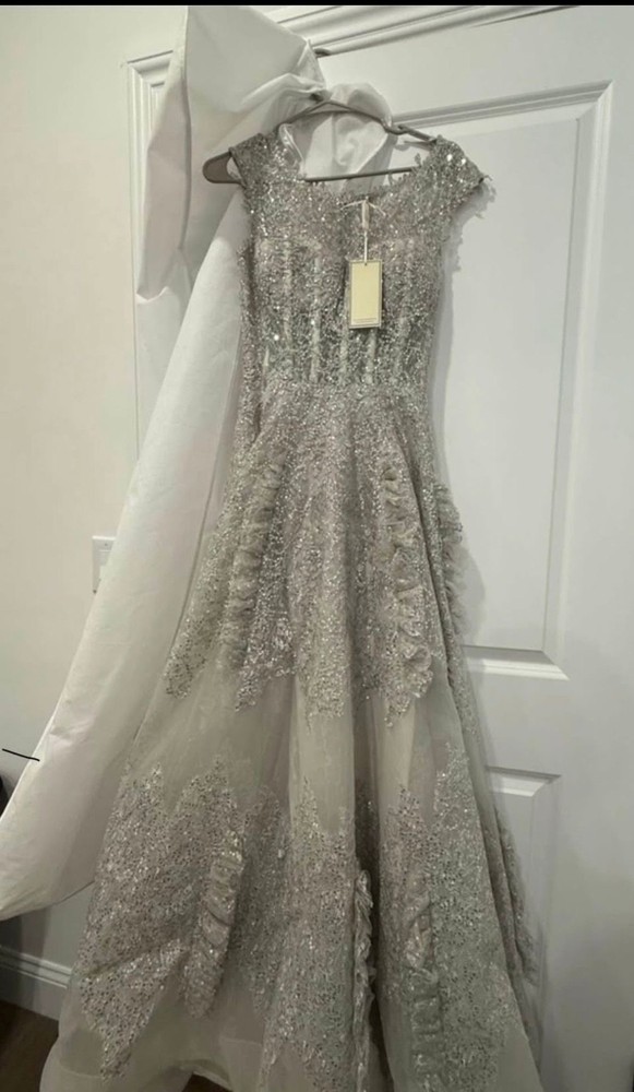 womens dresses size 4 Silver , corset style.. very beautiful , embellished.