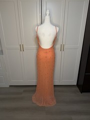 In perfect condition worn once. Much more vibrant in person.