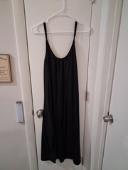 Camisole strap black cotton dress with pockets. Ideal for a night out!