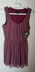 NEW ,SIZE LARGE IZ BYER DRESS. WINE COLORED POLYESTER.MID THIGH LENGTH.