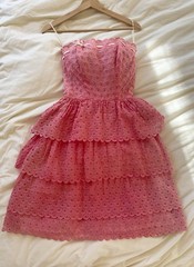 1950s pink strapless ruffle eyelet dress with white bow detail