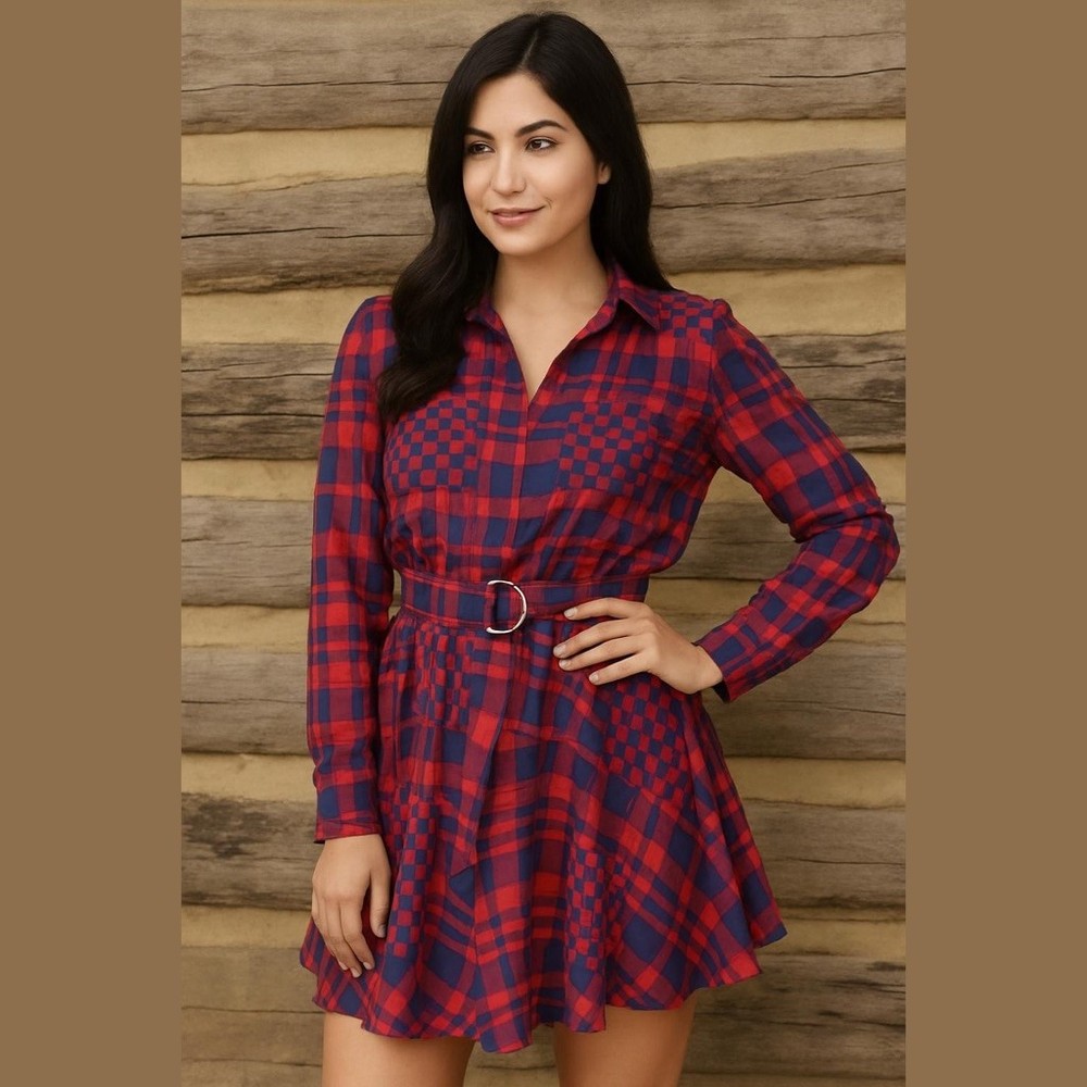 Asymmetrical dress features a bold red and blue plaid jacquard pattern. Small