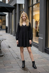 iliad USA Women&rsquo;s Black V-Neck Long Puff Sleeve Tiered Mini Dress