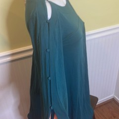 BCBGMaxazria ladies Jersey Knit Dress with 3/4 sleeves. Size medium. NWT.