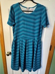 LULAROE: Amelia Teal Patterned Short Sleeve Fit & Flare Dress with pockets