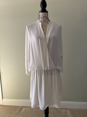 NWT Zuri Zuri by Flora satin-like rich cream colored mini dress.Size large