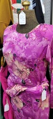 Modern Malaysian baju kurung with sequins.