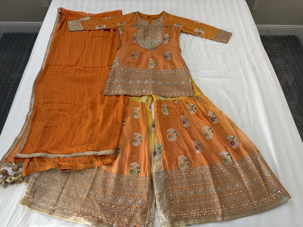Beautiful Indian dress suit in yellow-orange color for Punjabi Pakistani