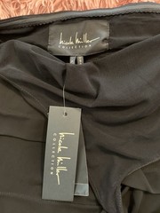 Nicole Miller Black Halter Dress with with ruffle accent in the front. SZ Medium