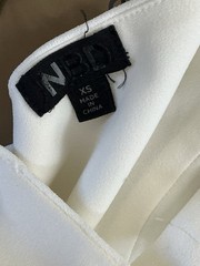 NBD Aldo White One Shoulder Mini Dress XS Revolve Asymmetric Slit Button Accent