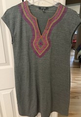 Spense features colorful embroidered detailing along the V-neckline S