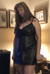 Lace up leather mini dress. Adjustable straps and underwire bra. Leather back.