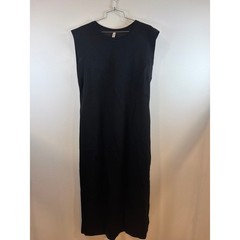 Long ankle length black dress.