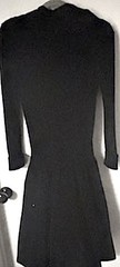 pg privilege black woman dress, knitted bodice and long sleeves. Skirt lined