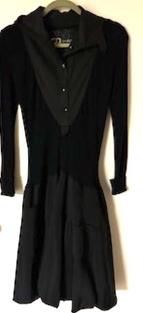 pg privilege black woman dress, knitted bodice and long sleeves. Skirt lined