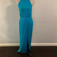 Forever 21 maxi sleeveless dress with slit in front. Color is turquoise.